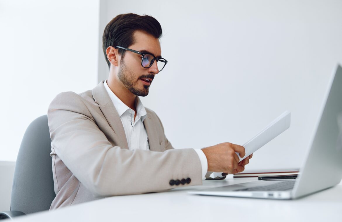 Planning businessman holding office paper